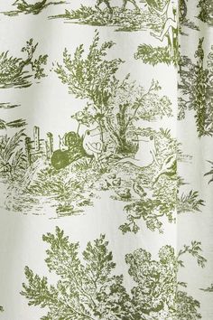 a green and white toiler print curtain