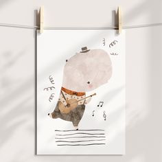 a poster hanging on a clothes line with an illustration of a bear playing the violin