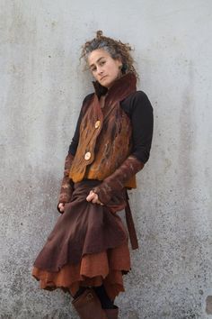 Earthy brown felt waistcoat Woodland pixie Nuno felt vest | Etsy Brown Wool Vest For Winter, Fitted Brown Bohemian Outerwear, Fitted Bohemian Brown Outerwear, Brown Wool Vest For Fall, Winter Festival Outerwear Vest, Bohemian Fall Vest Outerwear, Bohemian Brown Vest For Fall, Bohemian Vest Outerwear For Fall, Fitted Brown Bohemian Vest