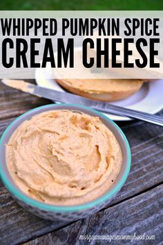 whipped pumpkin spice cream cheese in a glass bowl on a wooden table with text overlay