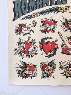 an old school tattoo sticker sheet with hearts, arrows and other tattoos on it