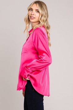 Flaunt your fun and fiery side with our Pink Fuchsia Satin Top! This gorgeous button down top is made from silky satin and comes in a playful pink fuchsia color. Perfect for adding a pop of color to any outfit, it's a must-have for anyone looking to spice up their wardrobe. (No more boring button-downs!). This is a generous fit Imported 100% poly A fit that is true to size Holiday Graphic Tees, Sleeveless Skirt, Suede Moto Jacket, Waffle Knit Top, Blue Tee, Polka Dot Blouse, Christian Tees, Pink Suede, Fuchsia Color