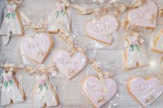 decorated cookies in the shape of heart and bride's dress