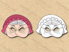 two paper masks with eyes and head coverings, one in pink and the other in white