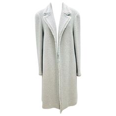 - The colours of this Chanel blue green and taupe long tweed coat jacket is beautifully done with silk lining. - Silver toned hardware CC on the sleeve. - Well shaped lapel. - Size 42. - 78% Wool, 22% Silk. Long Tweed Coat, Tweed Coat, Gianni Versace, Vintage Chanel, Wool Coat, Blue Green, Coats Jackets, Light Blue, Chanel