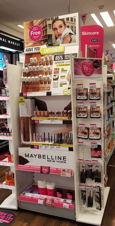 a display in a store filled with lots of cosmetics and beauty products on shelves next to each other