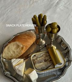 an assortment of food on a silver tray