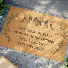 a door mat that says, salt from the earth stone from the ground keep this home safe and sound