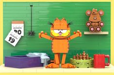 a paper cut out of garfield the cat standing in front of some toys