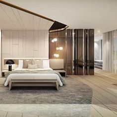 a bedroom with a large bed sitting on top of a wooden floor