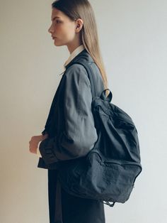 Editor's NoteROH SEOUL presents a bag with minimal mood and sophisticated design.- Crunchy and light material used- Nylon used mini backpack- Matt surface point- Spacious and practical to wear- Good to match with any outlooksMeasurements (in.)- Size: 11.61 in. * 14.37 in. * 5.12 in.- Strap: 22.83 in. (Max)Composition & Care- Upper: Nylon, Lining: 100% Poly- Keep away from direct exposure to water and sunlight- If wet, drain with a soft cloth and dry- If not in use, store in a dust bag in a cool, dry place- Be careful when using it as alcohol, oil, perfume, cosmetics, etc. may damage the productDesigner- by ROH SEOUL Oil Perfume, Sophisticated Design, Be Careful, Mens Outerwear, Men Shoes Size, Mini Backpack, Black Backpack, A Bag, Mens Bottom