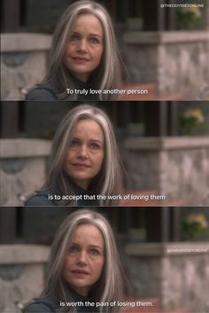 a woman with grey hair is looking at the camera and has two different words on her face