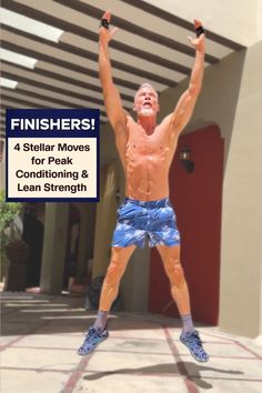 a man with no shirt is jumping in the air and holding his hands up while wearing blue shorts