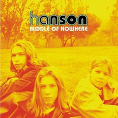 three women sitting on the ground in front of trees and grass, with text that reads harrison middle of nowhere