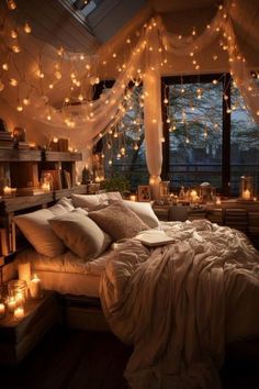 a bed with lots of lights hanging from it's ceiling and pillows on top of it