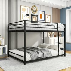 a black bunk bed sitting in a bedroom next to a white rug on top of a wooden floor