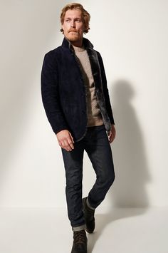 The Austin suede leather blazer is designed to go places. Handcrafted in soft lambskin suede and lined in shearling, Austin not only fights off the cold, but it also invites a second glance with all its impeccably tailored details, including natural corozo buttons and a stand-up collar. Wear Austin with jeans and a shirt for laid-back travel or with dress pants and a cashmere sweater when it's time to make a lasting impression. Partner Reading, Sheepskin Slippers, Sheepskin Coat, Leather Blazer, Cashmere Sweater, Leather Coat, Cashmere Sweaters, Suede Leather, Dress Pants