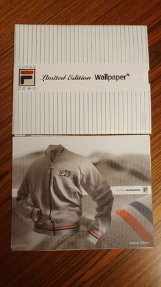 an old photo of a man's jacket on top of a card with the caption wallpaper