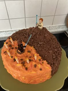 a star wars themed cake on a green plate