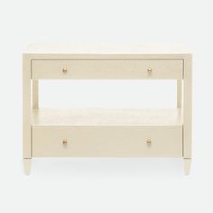 the side table has two drawers on one end and an open drawer on the other