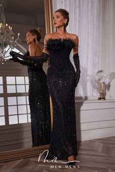 Transform into a vision of pure elegance and glamour with our Inaki Corset Feather Sequin Maxi Dress With Gloves. The intricately designed corset beautifully accentuates your curves, while the feathered sequin details add a touch of luxury. Complete the look with the included gloves for a truly stunning ensemble. Prom Dress With Gloves, Dress With Gloves, Corset Design, Pure Elegance, Light Dress, Sequin Maxi Dress, Sequin Maxi, Jumpsuits And Romper, Feather Dress