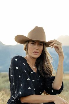 From coffee dates to country music festivals, the Teddy Cattleman Hat has you covered. With a true cattleman crown + wide western brim, this classic cowgirl hat is sure to stand out in a crowd. May we suggest taking Teddy up a notch? Shop Western bands + your favorite hat trims to make the look your own! S/M = 57cm M/L = 59cm 100% soft Australian wool Great sun protection Tan Cowgirl Hat, Cattleman Hat, Women Cowboy Hat, Classic Cowgirl, Cowgirl Vibes, Clogs Heels, Mom Accessories, Country Music Festival, Coffee Dates