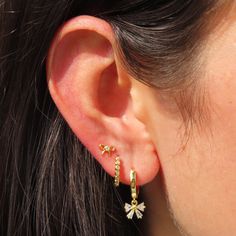 These stunning Take a Bow 2.0 Earrings will have you ready to make a statement with their delicate bow studs embellished with a sparkling CZ stone. These earrings are the perfect accessory to add a touch of elegance to any outfit. Chic Earrings With Sparkling Stones For Gift, Bow Earrings, Jewelry Inspo, Cz Stone, Gold Earrings, Take A, Sparkle, Take That, Stone