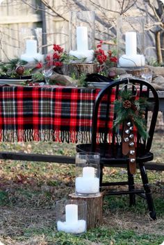 the table is set with candles and decorations