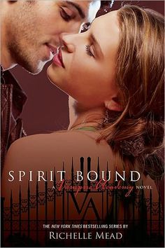 a man and woman kissing each other in front of a poster for the movie spirit bound