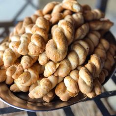 a plate full of cookies sitting on top of a table