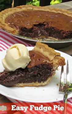 there is a pie with ice cream on the plate and another pie in the background