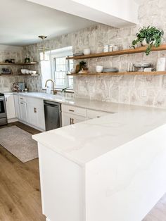 the kitchen is clean and ready for us to use in its new owner's home