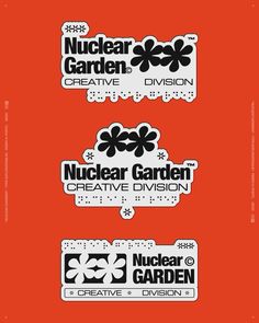 three stickers with the words nuclear garden and creative division on them, all in black and white