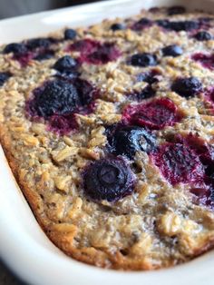 blueberry baked oatmeal in a white dish on top of a table