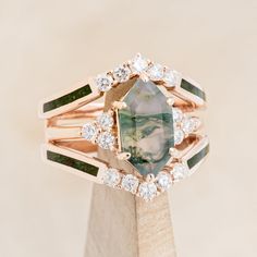 a close up of a ring with a stone in it