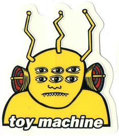 a yellow sticker with the words toy machine on it's face and headphones