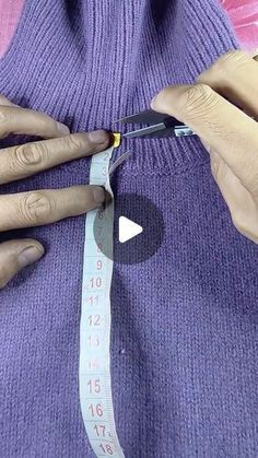 a woman measuring her waist with a tape measure and two hands on top of it