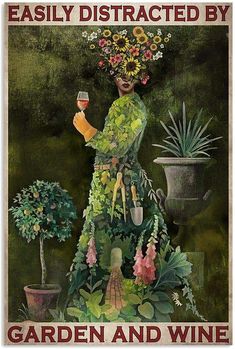 a woman holding a glass of wine standing in front of potted plants and flowers