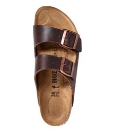 Classic Brown Slip-on Footbed Sandals, Leather Slip-on Slippers With Buckle Closure, Brown Leather Slippers With Arch Support, Comfortable Synthetic Sandals With Leather Footbed, Classic Textured Open Toe Slides, Classic Synthetic Sandals, Comfortable Brown Sandals With Arch Support, Comfortable Brown Slides With Arch Support, Leather Slide Slippers With Buckle