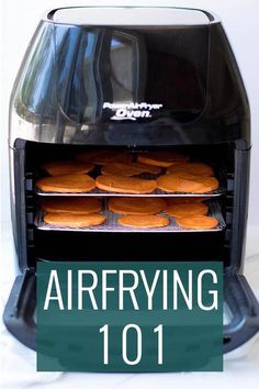 an air fryer with cookies in it and the words, air frying 101