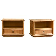 two wicker nightstands side by side with drawers on each end and one drawer open