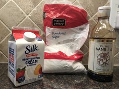 ingredients to make an ice cream dessert displayed on granite counter top with tile back splash