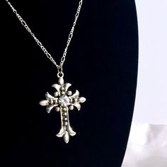 This silver gothic cross necklace embodies grunge jewelry aesthetics with its cross pendant, making it a meaningful religious gift for your Christian friend or her, perfect for women who adore minimalist jewelry and seek unique gift ideas. 𝐃𝐄𝐓𝐀𝐈𝐋𝐒: ⭐️ Necklace Lengths available are 14" 16" 18" 20" ⭐️ Cross charm size is 2" ⭐️ The Silver cross charm is silver plated over metal & cable necklace chain includes high-quality stainless-steel which are made hypoallergenic and are safe for those Cross Necklace Vintage, Silver Grunge Jewelry, Grunge Jewelry, Cross Jewelry, Cross Charms, Silver Cross, Religious Gifts, Polish Jewelry, Minimalist Jewelry