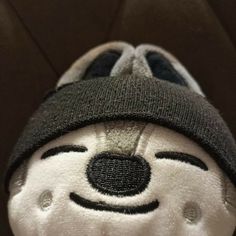 a stuffed animal with a hat on top of it's head is shown from above