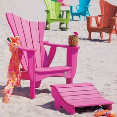 brightly colored chairs and umbrellas on the beach