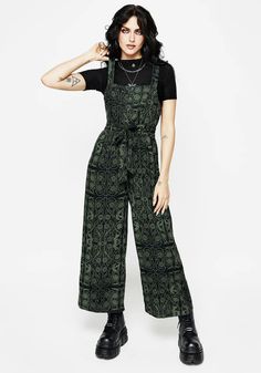 No morning’s sun lasts all day- Green & black Celtic print button front jumpsuit   - Fitted bodice flows into wide, roomy legs  - Supportive shoulder straps frame out squared neckline with a sleeveless finish - Non-functional buttoned front features mock horn buttons - Concealed side zipper for easy dressing  - Ela Tailored Jumpsuit, Jumpsuit Fitted, Squared Neckline, Wrap Shirt, Swimwear Dress, Easy Dressing, Printed Denim, Wide Leg Jumpsuit, Crop Shirt