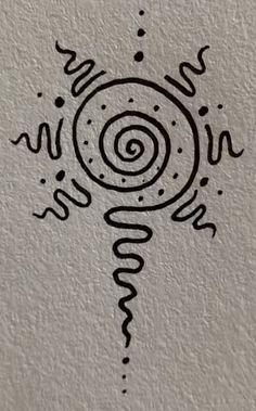 a drawing on the side of a wall that has an image of a spiral in it