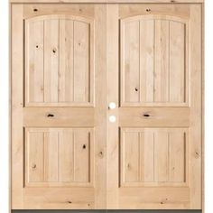 an image of two wooden doors that are open