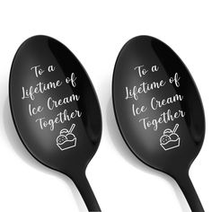 two black spoons with white writing on them that say to a lifetime of ice cream together