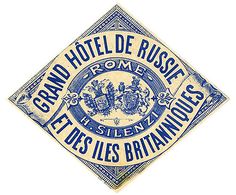 a blue and white tile with the words grand hotel de risice